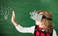 Schoolchild with virtual reality headset in class Royalty Free Stock Photo