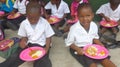 Schoolchildren having lunch at a school in South Africa i Royalty Free Stock Photo