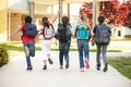 Schoolchildren at home time Royalty Free Stock Photo