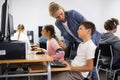 Schoolchildren preparing for lessons on the computer