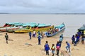 Schoolchildren return from school by canoe Royalty Free Stock Photo