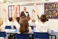 Schoolchildren Studying In Classroom