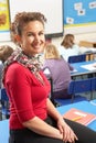 Schoolchildren Studying In Classroom With Teacher Royalty Free Stock Photo