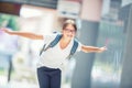 Schoolgirl with bag, backpack. Portrait of modern happy teen school girl with bag backpack. Girl with dental braces and glasses Royalty Free Stock Photo