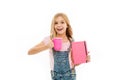 Schoolgirl with book or notepad and mug having tea break. Water balance concept. Enjoying tea before school classes Royalty Free Stock Photo