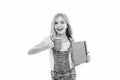 Schoolgirl with book or notepad and mug having tea break. Water balance concept. Enjoying tea before school classes Royalty Free Stock Photo