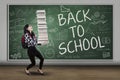 Schoolgirl with books back to school Royalty Free Stock Photo