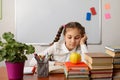 Schoolgirl bored doing homework Royalty Free Stock Photo