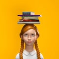 Schoolgirl character with books on her head