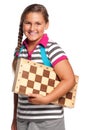 Schoolgirl with chessboard