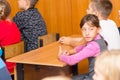 Schoolgirl in class at the Desk