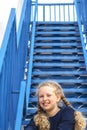 Schoolgirl climbs the stairs. girl in a uniform