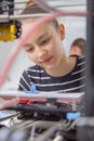 Schoolgirl with 3d printe. education, technology. Royalty Free Stock Photo