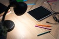 schoolgirl desk. workplace table with tablet,