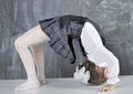 Schoolgirl doing gymnastics Royalty Free Stock Photo