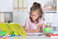 Schoolgirl doing homework Royalty Free Stock Photo