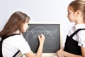 Schoolgirl, draws the schedule Royalty Free Stock Photo