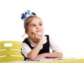 Schoolgirl dreaming in classroom Royalty Free Stock Photo