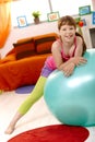 Schoolgirl with exercise ball Royalty Free Stock Photo
