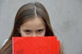 Schoolgirl with exercise books and folders Royalty Free Stock Photo