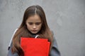 Schoolgirl with exercise books and folders Royalty Free Stock Photo