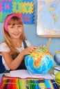 Schoolgirl on geography lesson Royalty Free Stock Photo