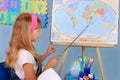 Schoolgirl on geography lesson Royalty Free Stock Photo