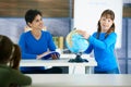 Schoolgirl with globe Royalty Free Stock Photo