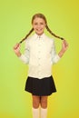 Schoolgirl happy smiling pupil long hair. Beginning of academic year. Educational activity. Homeschooling or visiting