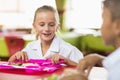 Schoolgirl having lunch during break time in school cafeteria Royalty Free Stock Photo