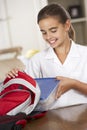 Schoolgirl With Healthy Lunchbox In Kitchen Royalty Free Stock Photo