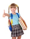 Schoolgirl holding books and showing thumb up.