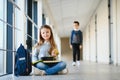 schoolgirl holding lunch box and apple going to eat Royalty Free Stock Photo