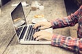 Schoolgirl with laptop and cappuccino Royalty Free Stock Photo