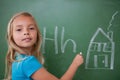 Schoolgirl learning the alphabet Royalty Free Stock Photo