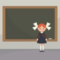 Schoolgirl near the school board. Royalty Free Stock Photo
