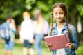 Schoolgirl with pink tablet