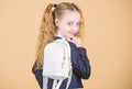 Schoolgirl ponytails hairstyle with small backpack. Carrying things in backpack. Learn how fit backpack correctly. Girl Royalty Free Stock Photo