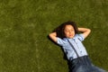 Schoolgirl relaxing in the school playground