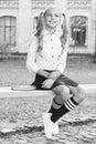 Schoolgirl relaxing sit on bench with book. Life balance. Pleasant minutes of rest. Time to relax and have fun. Relaxing Royalty Free Stock Photo