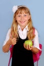 Schoolgirl showing good luck sign Royalty Free Stock Photo