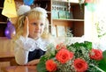 Schoolgirl sitting at a desk at school