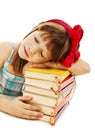 Schoolgirl sleeping on school book Royalty Free Stock Photo