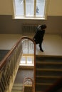 Schoolgirl in staircase