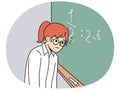 Schoolgirl standing near chalkboard gets, upset because doesnt know solution of mathematical example