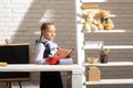 Schoolgirl studying homework math during lesson at classroom, education concept, Cute schooler. Portrait of lovely Royalty Free Stock Photo