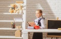 Schoolgirl studying homework math during lesson at classroom, education concept, Cute schooler. Portrait of lovely Royalty Free Stock Photo