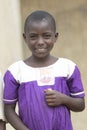 Happy Schoolgirl in Uganda with school uniform Royalty Free Stock Photo