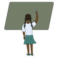 African American schoolgirl with pigtails writes on the blackboard with chalk, view from the back