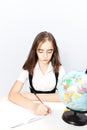 Schoolgirl writes the task